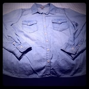 Women's button up denim shirt.